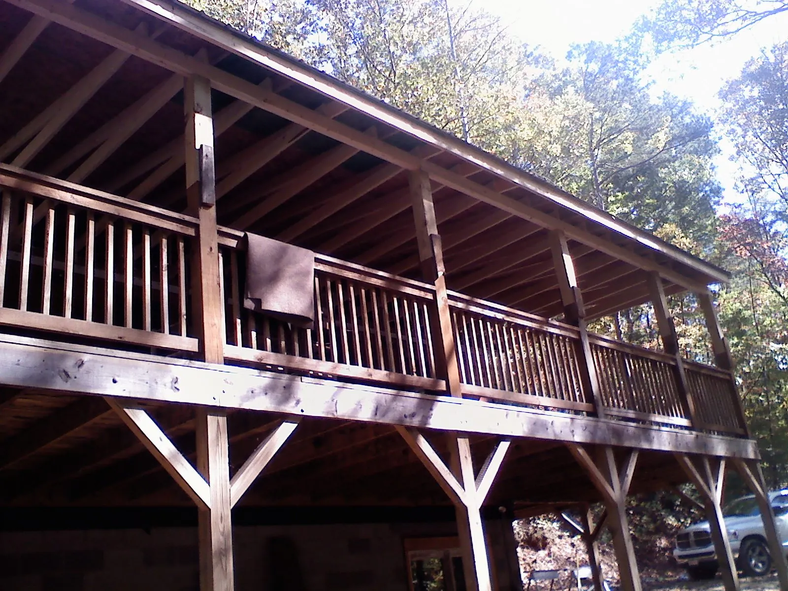 Timber framing under a new elevated porch and deck — Roof Leak Repair in Durand by Roofing Brothers